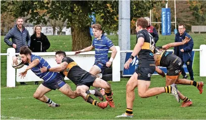  ?? Rob. Hockney ?? ●●Tom Jennings goes over for the last try of the match