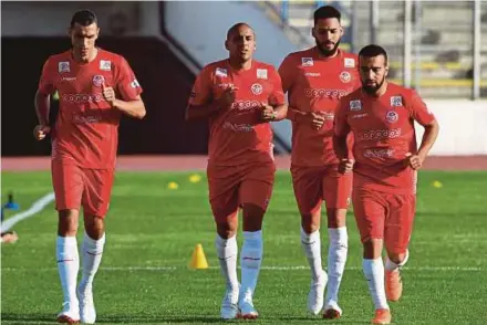  ?? AFP PIC ?? (From left) Tunisia’s Saif-Eddine Khaoui, Wahbi Khazri, Dylan Bronn and Naim Sliti train at the Olympic Stadium El Menzah in the Tunisian capital last Monday.