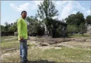  ?? JASON DEAREN — THE ASSOCIATED PRESS ?? In this photo taken in Crosby, Texas, across the San Jacinto River from Houston, Rafael Casas tours his storm ravaged house in a small working-class neighborho­od that sits between two Superfund sites, French LTD and the Sikes Disposal Pits. The area...