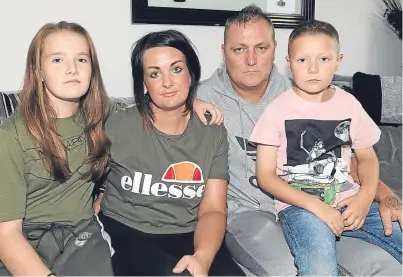  ?? Picture: George McLuskie. ?? Vicky Masterton and Ross Gray with their children Morgan, left and Jordyn, both of whom have had problems at their schools because of Type 1 diabetes.