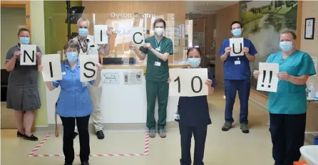  ??  ?? Staff celebrate the 10th anniversar­y of the opening of the RUH’S Dyson Centre for Neonatal Care