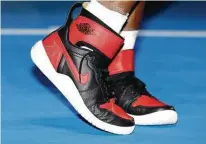  ?? Clive Brunskill / Getty Imag ges ?? The shoes Serena Williams put on after the Australian Ope en came courtesy of another famous No. 23 — Michael Jordan.. Not coincident­ally, Williams has 23 Grand Slam singles title es.