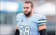  ?? Jonathan Bachman / Getty Images ?? State native Christian Montano, shown here at Tulane, is working out at the new NFL Alumni Academy in Ohio with hopes of signing with a team.