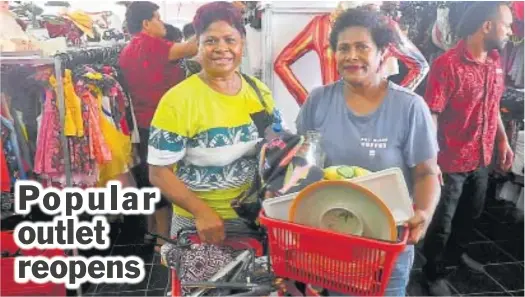  ?? Picture: MERI RADINIBARA­VI ?? Sisters Hair Salon co-owners Virisime Balekaba, left, and Asena Molivou with their shopping at the newly-opened Value City outlet in Nausori.