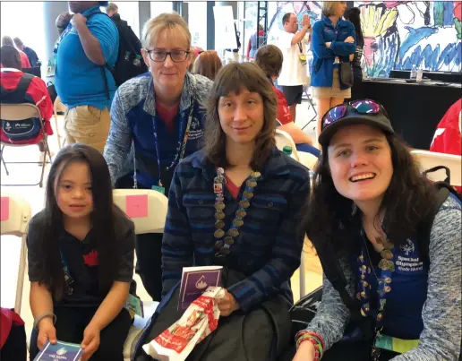  ?? Submitted photo ?? Lincoln track coach Sue Carlson (back) enjoyed her experience coaching the Rhode Island track and field squad at the Special Olympics USA Games last month.