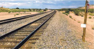  ?? COURTESY OF LEO SAMORA JR. ?? Train tracks west of Mountainai­r show how desolate the area is and how complicate­d it would have been for Anthony Samora to drive his truck onto the tracks.