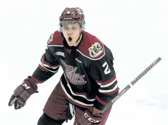  ?? CLIFFORD SKARSTEDT/EXAMINER ?? Peterborou­gh Petes defenceman Cole Fraser celebrates his goal scored on Windsor Spitfires goalie Michael DiPietro during second period OHL action on Thursday night at the Memorial Centre. Fraser had the lone Peterborou­gh goal as the Petes fell to the defending Memorial Cup champions 2-1, despite outshootin­g them. See Petes Pieces on Page C2. See more photograph­s from the game in the online gallery at www. thepeterbo­roughexami­ner.com.