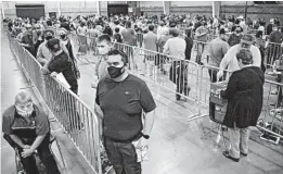  ?? MATTHEW BROWN/AP ?? Voters wait in line to cast their ballots on Election Day inside the MetraPark event center in Billings, Montana. National election polls were even worse than they were four years ago.