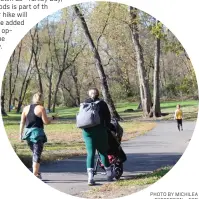  ?? PHOTO BY MICHILEA PATTERSON – FOR MEDIANEWS GROUP ?? Below: People take a stroll on the Schuylkill River Trail at Pottstown Riverfront Park.