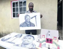  ?? PHOTOGRAPH­ER KENYON HEMANS/ ?? Artist Rayon Griffiths from Waugh Hill in Rock River, St Catherine, displays some of his drawings of athletes and musicians.