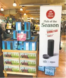  ?? Tara Duggan / The Chronicle ?? A sign advertises “farm fresh” Amazon Echo and Echo Dot Internet speakers at a Whole Foods Market in San Francisco.