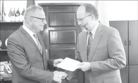  ?? (CARICOM photo) ?? Ambassador Jules Bijl presenting his letters of credence to CARICOM Secretary-General, Ambassador Irwin LaRocque