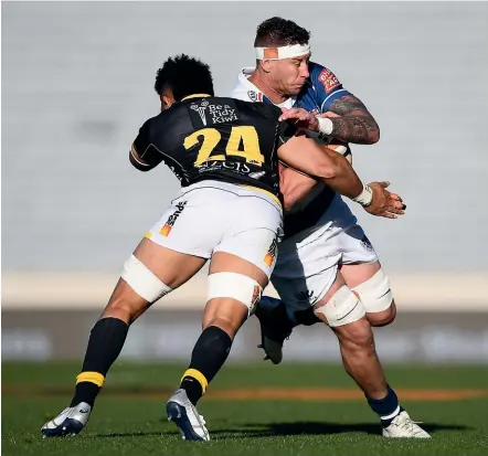  ?? GETTY IMAGES ?? Strong defence was key to Wellington’s win, as Ardie Savea shows by stopping Auckland’s Scott Scrafton.