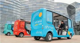  ??  ?? Ohmio Automotion shuttles at a demonstrat­ion in Christchur­ch last year. The company will relocate some employees from Auckland to build up its new research centre in Heshan, China.