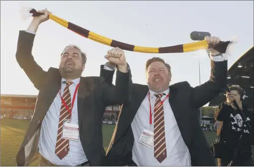  ?? PICTURE: MARTIN RICKETT/PA ?? ON OUR WAY TO WEMBLEY: Bradford City co-owners Edin Rahic, left, and Stefan Rupp celebrate after the final whistle at Highbury Stadium, Fleetwood.