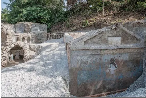  ??  ?? This undated photo released by the Pompeii archeologi­cal park shows a view of the tomb of Marcus Venerius Secundio, located in the necropolis of Porta Sarno in an area not yet open to the public in the east of Pompeii’s urban center.