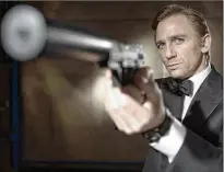  ?? GREGWILLIA­MS/ MGM/ COLUMBIA PICTURES ?? DanielCrai­g stars as JamesBond in the 2006remake of “Casino Royale.” It topped the 1967 original, which had an enormous cast and five directorsw­hogoofed around.