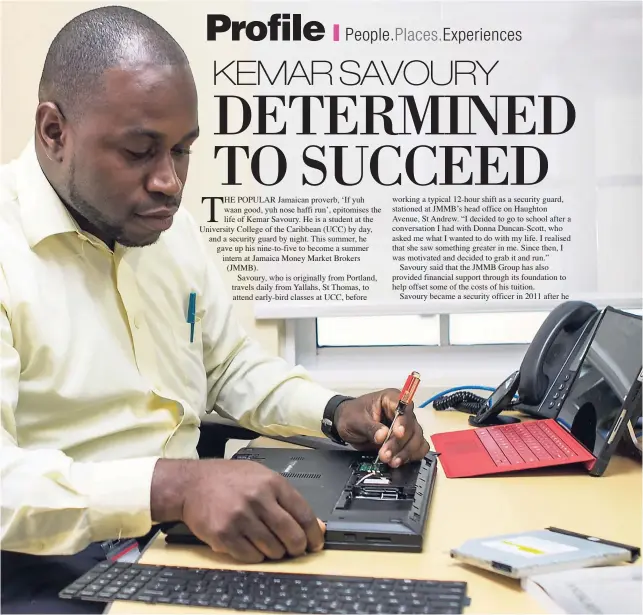  ?? CONTRIBUTE­D ?? Kemar Savoury putting his theoretic informatio­n technology knowledge into practice during his internship at JMMB, as part of the company’s summer employment programme.