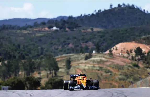  ?? Lars Baron ?? > Lando Norris driving his McLaren F1 car during practice ahead of the F1 Grand Prix of Portugal at Autodromo Internacio­nal Do Algarve