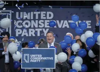  ?? JEFF MCINTOSH/THE CANADIAN PRESS ?? Jason Kenney celebrates his victory as the first official leader of the Alberta United Conservati­ve Party in Calgary.