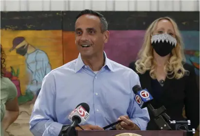  ?? Boston herald FIle ?? REASON TO SMILE: Somerville Mayor Joseph Curtatone, seen at an Aug. 13 event, will take the top job at the Northeast Clean Energy Council next year.