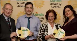  ??  ?? Londis Retailing Standard Awards: Londis Retail Developmen­t Manager Dermot O’Neill with Michael Hanrahan Jr from Londis Piercestow­n and Hillary O’Brien and Daria Chabros from O’Brien’s Londis, Larkins Cross.