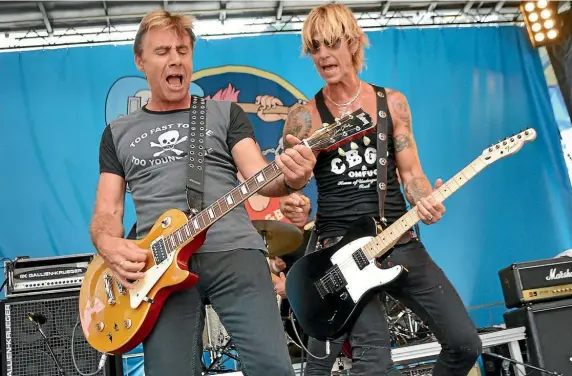  ??  ?? Rough-and-ready duo Glen Matlock and Duff McKagan of Loaded play at the 2012 CBGB Festival in New York.