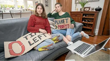  ?? MONIQUE FORD/STUFF ?? Wellington co-ordinator Oli Morphew, left, and Tara Watkins from Wellington participat­ed in the School Strike for Climate from their homes.