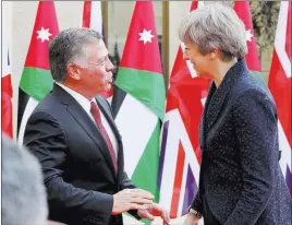  ?? Raad Adayleh ?? The Associated Press British Prime Minister Theresa May meets Jordan’s King Abdullah at the Royal Palace in Amman, Jordan, on Thursday.