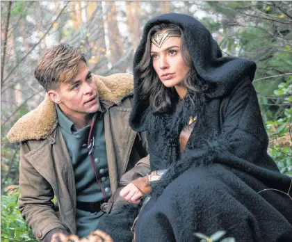  ?? CLAY ENOS/WARNER BROS. PICTURES VIA AP ?? This image released by Warner Bros. Pictures shows Chris Pine, left, and Gal Gadot in a scene from, “Wonder Woman.” Despite enthusiast­ic discourse around diversity in film, a report from the University of Southern California’s Annenberg Inclusion Initiative says when it comes to the numbers, little has changed. In a survey of the top 100 films of 2017, 33 featured women in a lead or co-lead. And 31.8 percent of the speaking characters were female, a number that has stayed static for a decade.