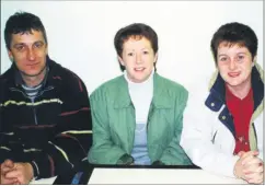 ?? ?? Ger and Deirdre Shinnick, along with Mary Dennehy, at the presentati­on of Swim Week certificat­es to young swimmers in Fermoy Leisure Centre.