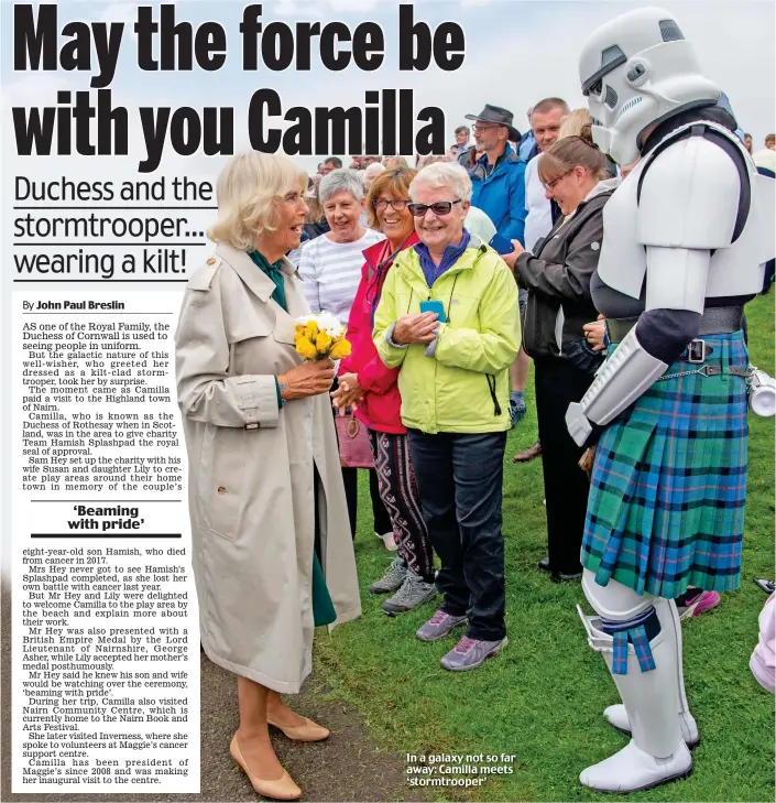  ?? ?? In a galaxy not so far away: Camilla meets ‘stormtroop­er’
