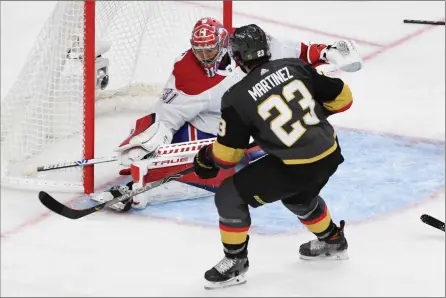  ?? The Associated Press ?? Montreal Canadiens goaltender Carey Price stops a shot by Vegas Golden Knights defenceman Alec Martinez during Game 2 of their Stanley Cup semifinal playoff series, Wednesday, in Las Vegas.