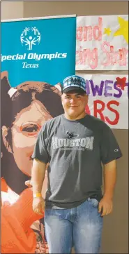  ?? (Courtesy Photo/Gary Schottle) ?? Tank poses in the Athletes Village at the Texas Special Olympics in College Station, Texas, in 2011. “I love to spread love and hope for our country and our world,” Tank said. “We should all love one another and bring hope and inspiratio­n to other people.”