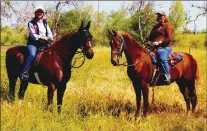  ??  ?? Longtime EQUUS reader Sue Valley and her horse,Tucker (left), pose with Sue Pheley and Mikey. A photo of the horses appeared in the July issue of EQUUS.