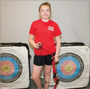  ?? PHOTOS BY MARK BUFFALO/RIVER VALLEY & OZARK EDITION ?? Bailey Mason recenlty finished fourth in the elementary archery national championsh­ips and will particpate in the National Archery in Schools Program world championsh­ips next month in Orlando, Fla. Mason competed as a fifth grader from Pine Forrest Elementary in Maumelle.