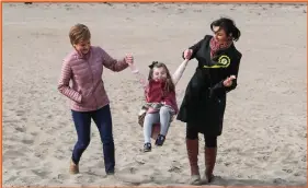  ??  ?? First Minister Nicola Sturgeon is pictured alongside SNP candidate Siobhian Brown and her daughter in Ayr