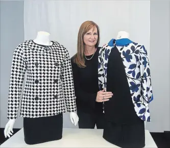  ?? DAVID BEBEE WATERLOO REGION RECORD ?? Monarch Clothes CEO Patricia Quinn stands with examples of her company's adaptive clothing for people who have difficulty dressing themselves or a loved one.