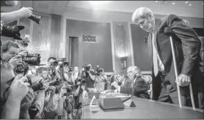  ?? AP/ ANDREW HARNIK ?? Secretary of State John Kerry arrives Thursday to testify before a Senate committee reviewing the Iran nuclear agreement in Washington. At the table with him are ( center) Treasury Secretary Jack Lew and Secretary of Energy Ernest Moniz.