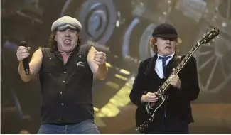  ?? ?? Brian Johnson (left) and Angus Young (right) of AC/DC perform at the Oracle Arena in Oakland, California on Tuesday, 2 December, 2008.