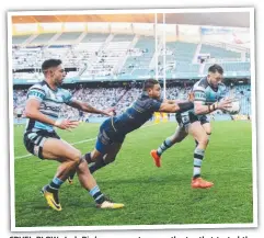  ?? CRUEL BLOW: Jack Bird goes over to score the try that tested the Cowboys’ resolve against the Sharks on Sunday. ??
