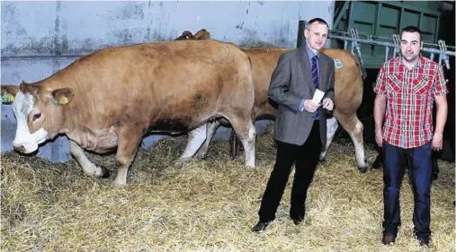  ?? Photograph: Jim Irvine ?? FUNDRAISER: Judge John Angus, left, with Ian Thomson from Middleton of Potterton farm, which hosted the event.