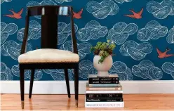  ?? Associated Press ?? Hygge & West shows storyline removable wallpaper in blue.