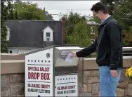  ?? PETE BANNAN — MEDIANEWS GROUP ?? Troy Hornung found the ballot box at the Haverford Municipal building was locked.