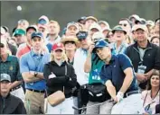  ?? Jamie Squire Getty Images ?? WITH THIS chip on the 18th hole, Jordan Spieth was able to make a bogey and keep a two-shot lead.