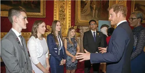  ??  ?? Prince Harry speaks to the award winners during the The Diana Award's inaugural Legacy Award this year.