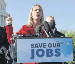  ?? GETTY IMAGES/AFP ?? Sara Nelson, internatio­nal president of the Associatio­n of Flight Attendants-CWA, AFL-CIO, gestures during a news conference outside the US Capitol on Tuesday.