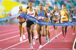  ?? ASHLEY LANDIS AP ?? Nia Akins, who prepped at Rancho Bernardo High, wins the women’s 800 meters final at the U.S. track and field championsh­ips in Eugene, Ore., on July 9.