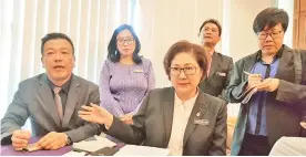  ??  ?? Christina (seated right) introducin­g the new Sabah Tourism Board chairman Ken Pan Ying On (left) and acting general manager Noredah Othman (second left) at the State Assembly yesterday.