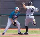  ?? JOURNAL FILE ?? Jack Zoellner, left, says the Lobos have hit well in some games and pitched well in others, but have not often enough done both at the same time.